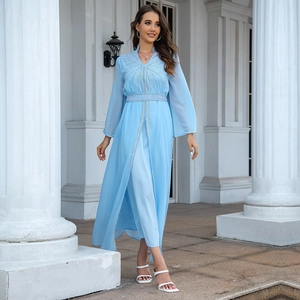 Exquisite light blue kaftan dress with detailed rhinestone patterns and chiffon fabric