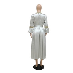 Elegant satin maxi dress with gold lace trim on sleeves and lantern sleeve details