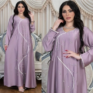Elegant mauve long-sleeve abaya dress with intricate sequin and rhinestone embroidery