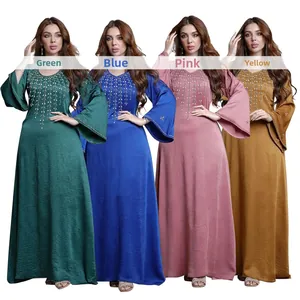 Close-up of beaded V-neckline and flare sleeves on satin loose-fit kaftan dresses