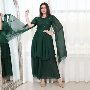 Elegant emerald green sequined evening gown with chiffon cape sleeves and layered skirt