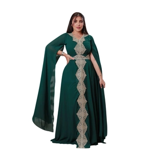 Deep green pearl chiffon evening dress with gold lace embroidery and cape sleeves