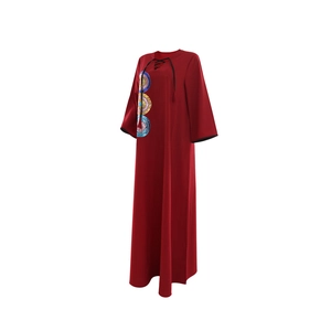 Detail of dark red dress showing sequin embroidery and black neck ties on a 3D model