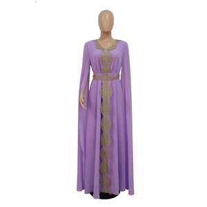 Detail of lavender chiffon evening gown featuring golden lace embroidery and cape-style sleeves