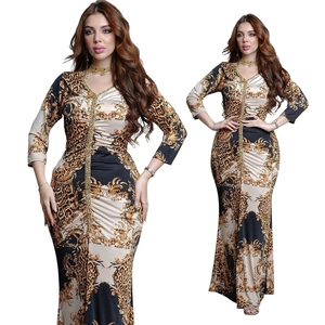 Detail of V-neckline with gold trim and leopard baroque print on slim fit fishtail dress