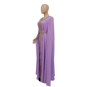Detail of light purple chiffon evening dress with gold embroidery and cape sleeves