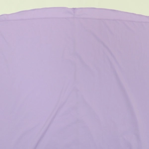 Detail showing high-quality lavender chiffon fabric with precise double-stitched hem edges