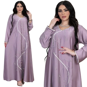 Detail of lavender satin abaya featuring silver vine embroidery and sequin trim