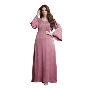 Detail of mauve V-neck abaya dress with sequin embroidery and flared sleeves