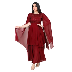 Detail view of burgundy sequined evening dress with chiffon cape sleeves and belt