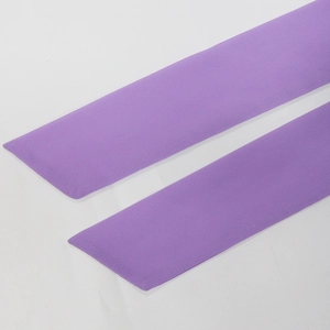 Detail of purple chiffon dress belts showing soft matte texture and clean edges