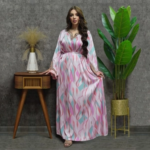 Elegant Middle Eastern kaftan with pink and teal abstract print and gold embroidery