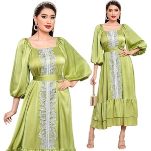 Avocado green satin kaftan dress with silver embroidery and puffy lantern sleeves