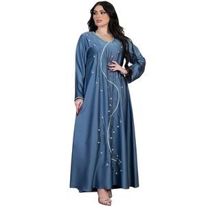 Detailed view of dark blue satin abaya with intricate silver vine embroidery and sequins