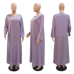 Detail of silver vine beadwork and embroidery on light purple modest Abaya dress