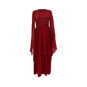 Detail of sequined bodice and split cape sleeves on red evening maxi dress with belt