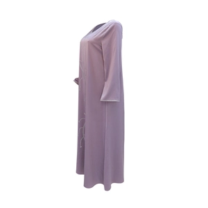 Detail of grey-purple long robe dress with silver rhinestone plant patterns on front