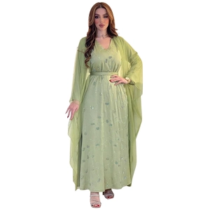 Grass green V-neck rhinestone mesh dress with sequined patterns and sheer outer layer