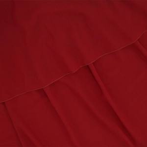 Detailed macro shot of dark red sequin evening dress fabric with rolled hem stitching