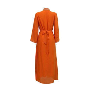 Detailed back view of an orange chiffon kaftan dress with white rhinestone collar accents