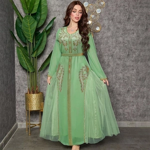 Elegant light green mesh kaftan dress with gold embroidery and long sleeves for women