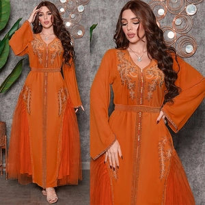 Detailed embroidery and sequins on orange long-sleeve kaftan dress with tulle