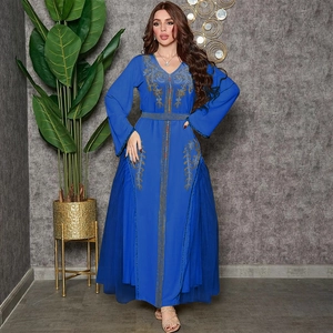 Elegant royal blue kaftan dress with intricate gold embroidery and mesh paneling