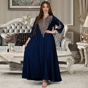 Navy blue kaftan dress with colorful ethnic embroidery and loose bohemian design