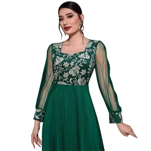 Dark green kaftan dress with white floral embroidery and mesh sleeves on white background