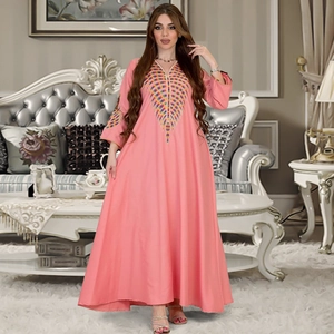 Elegant pink kaftan dress with colorful embroidery on neckline and long sleeves