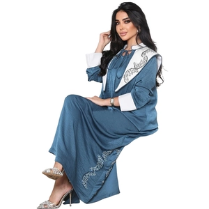 Detailed silver sequin embroidery on the blue satin Jalabiya dress collar