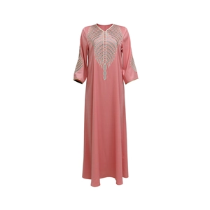 Detail of colorful ethnic geometric embroidery on the neckline of a pink chiffon abaya