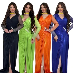 Detail view of sparkly evening gowns with waist rhinestone buckle and high slit design