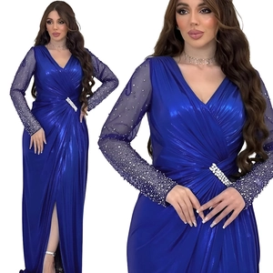 Royal blue long-sleeved evening gown with shimmering sequins, V-neck, and side split
