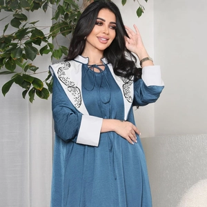 Fashionable dark blue Jalabiya dress with white floral embroidery and tassel necktie