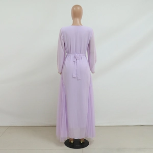 Detail of lavender mesh kaftan dress showing beaded cuffs and back waist bow tie