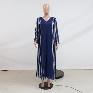 Close-up of navy blue chiffon abaya with vertical silver sequin stripes and V-neckline