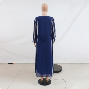 Back view of a navy blue chiffon abaya with silver vertical stripes and waist tie detail