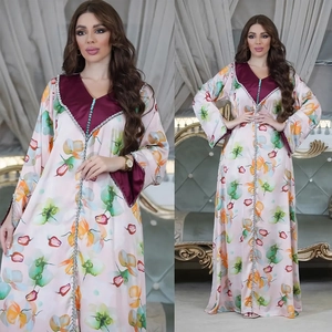 Floral print kaftan maxi dress with long sleeves and contrasting embroidered neckline