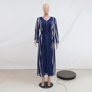 Detail view of navy blue maxi dress with silver vertical stripes and V-neckline