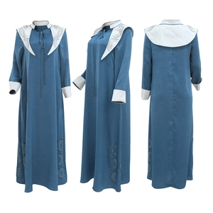 Detail view of grey-blue Jalabiya dress with rhinestone moon patterns and contrast collar