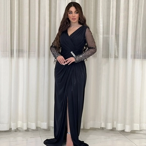 Elegant deep V-neck evening gown with sequined sheer sleeves and side slit design