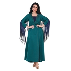 Elegant dark green long dress with rhinestones, V-neckline and long blue fringe sleeves