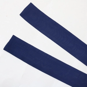 Detail view of navy blue striped sequin chiffon robe fabric showing textile texture