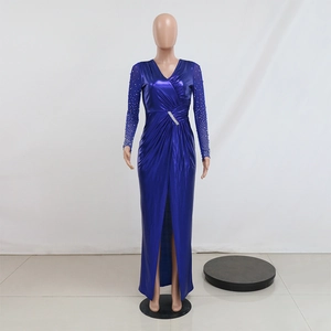 Detail of blue-purple evening gown with silver sequins and high slit on waist side