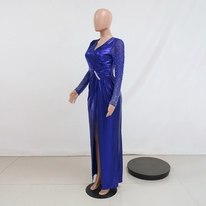 Detail of royal blue evening gown featuring silver rhinestones and waist side slit