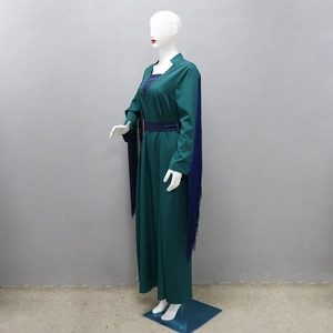 Detailed view of dark green abaya with blue long fringe sleeves and sparkling stone accents