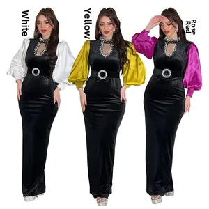 Detail of velvet gowns with colorful satin puff sleeves and rhinestone waist buckles