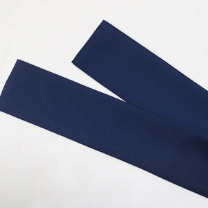 Macro detail of dark blue rhinestones tassel fabric with twill texture and neat edges