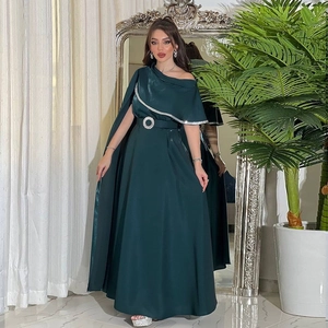 Elegant dark green satin evening gown with asymmetrical off-shoulder cape and rhinestone belt